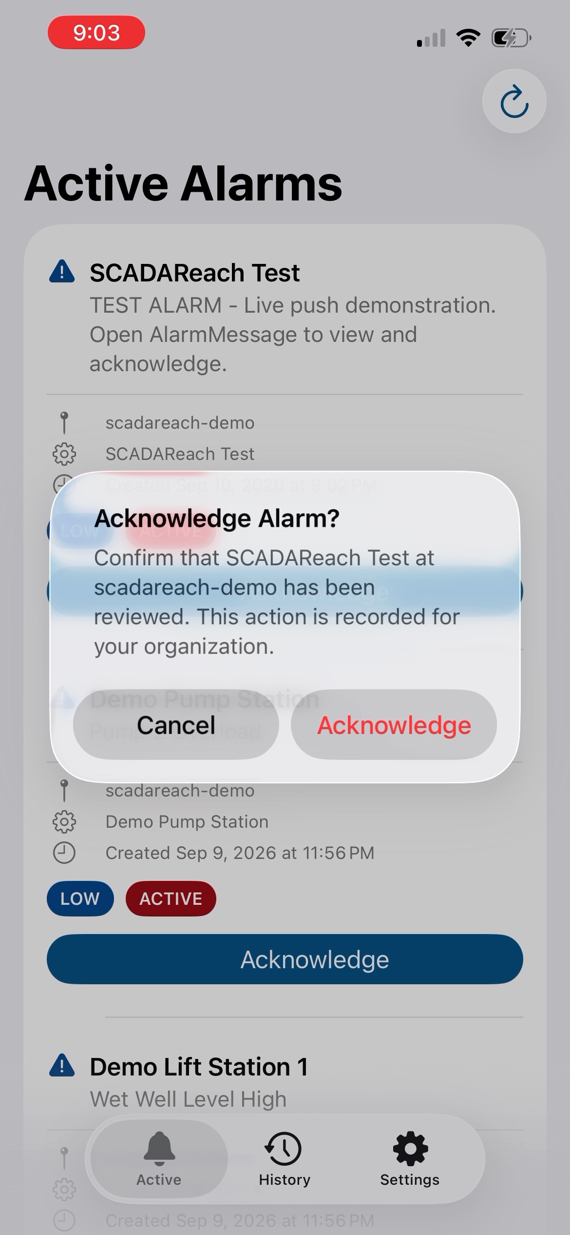 An Acknowledge Alarm confirmation explaining that the operator response is recorded for the organization.